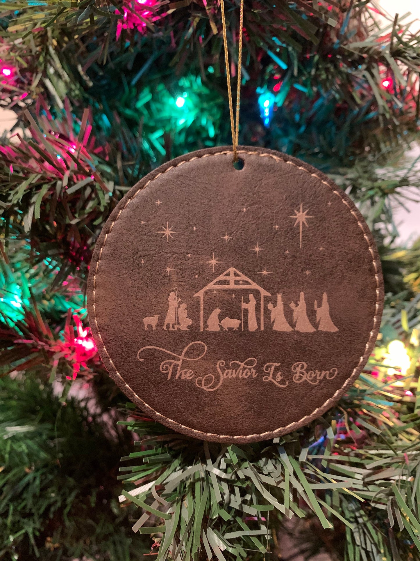 Round Savior is Born Leatherette Ornament
